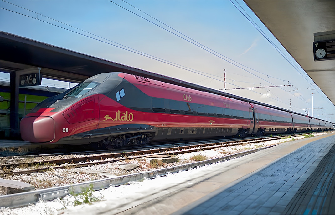 Italo train stationed at Rome platform for travel to Naples.