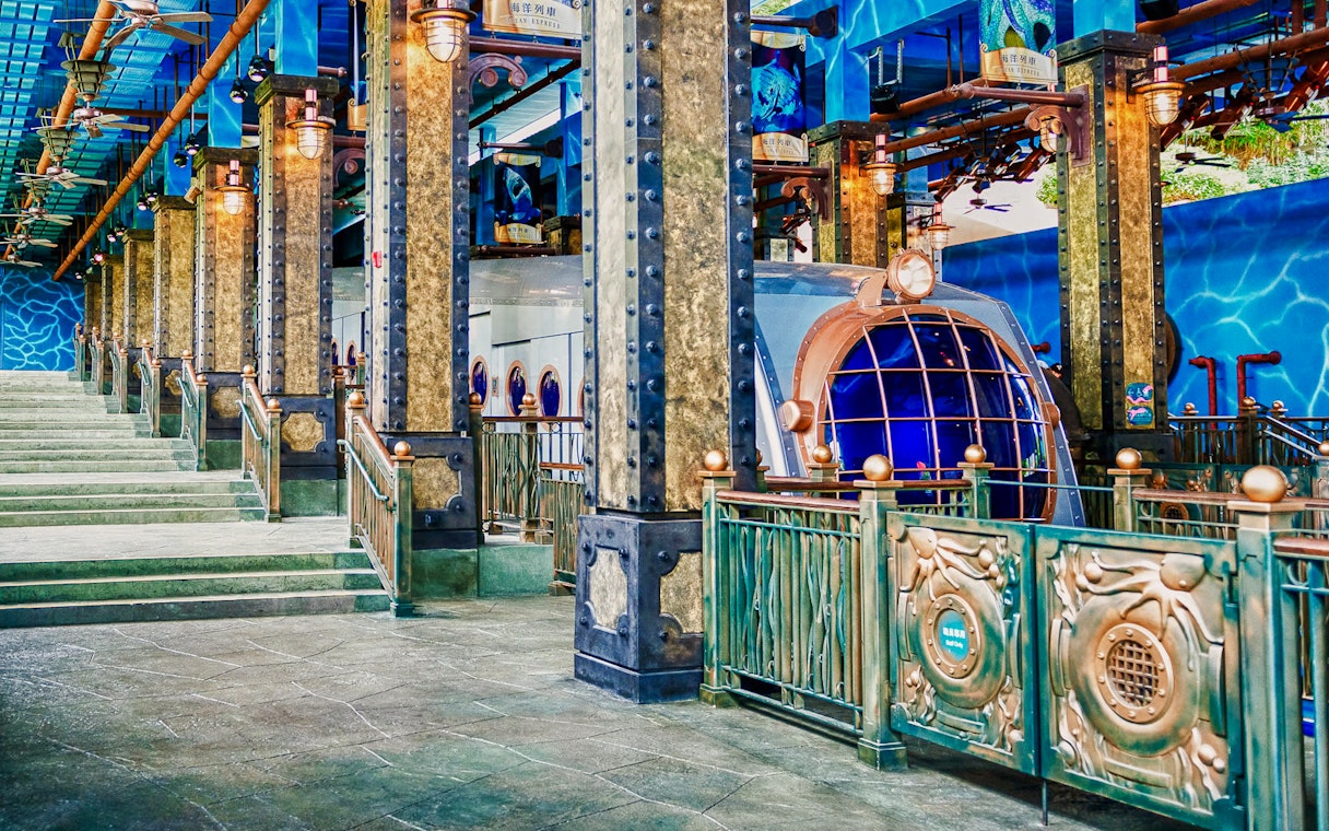 Ocean Express funicular station at Ocean Park, Hong Kong, with decorative pillars and blue-themed design.