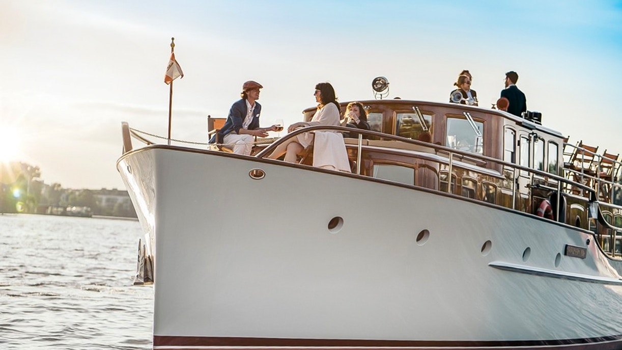 Fitzgerald boat on Berlin Sightseeing Cruise with passengers enjoying the view.