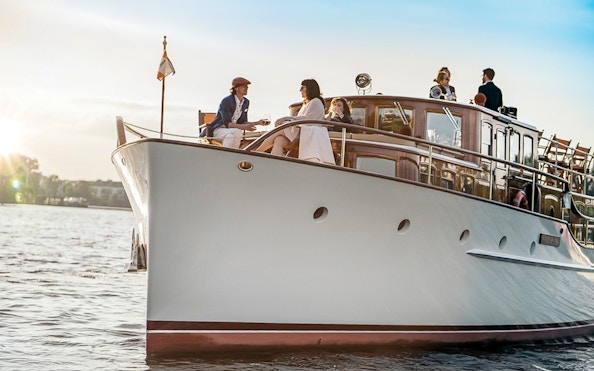 Fitzgerald boat on Berlin Sightseeing Cruise with passengers enjoying the view.