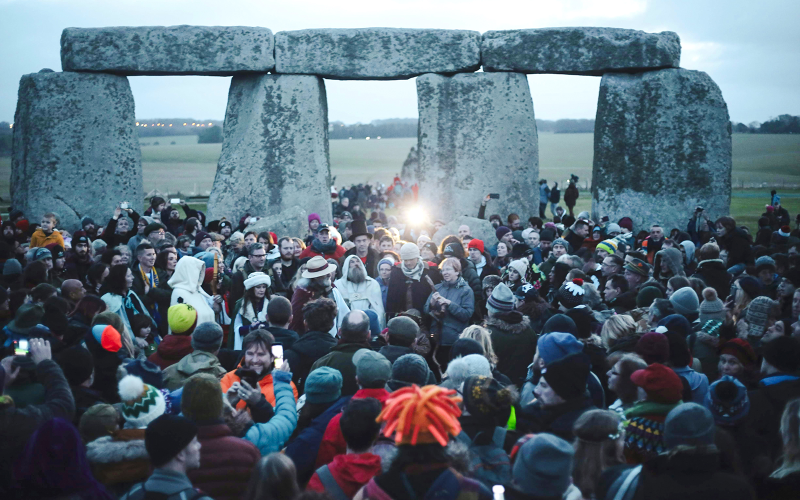 Crowd gathered at Stonehenge for Winter Solstice celebration.