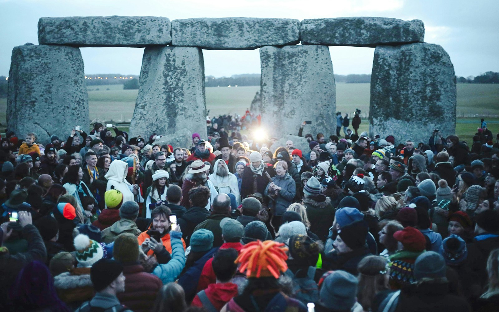 Crowd gathered at Stonehenge for Winter Solstice celebration.