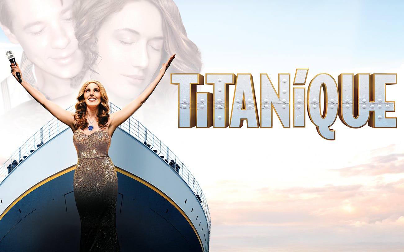 Performer on ship with Titanique logo in background