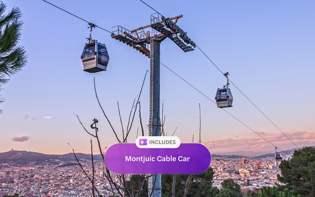 Montjuic Cable Car with Barcelona cityscape in the background.