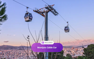 Montjuic Cable Car with Barcelona cityscape in the background.