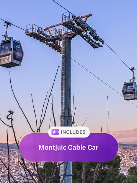 Montjuic Cable Car with Barcelona cityscape in the background.