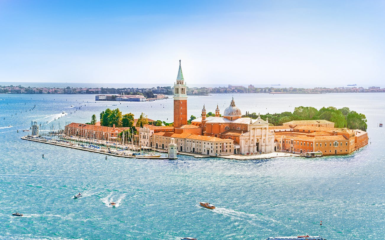 Venice aerial view of San Giorgio Maggiore Island and lagoon during helicopter tour.