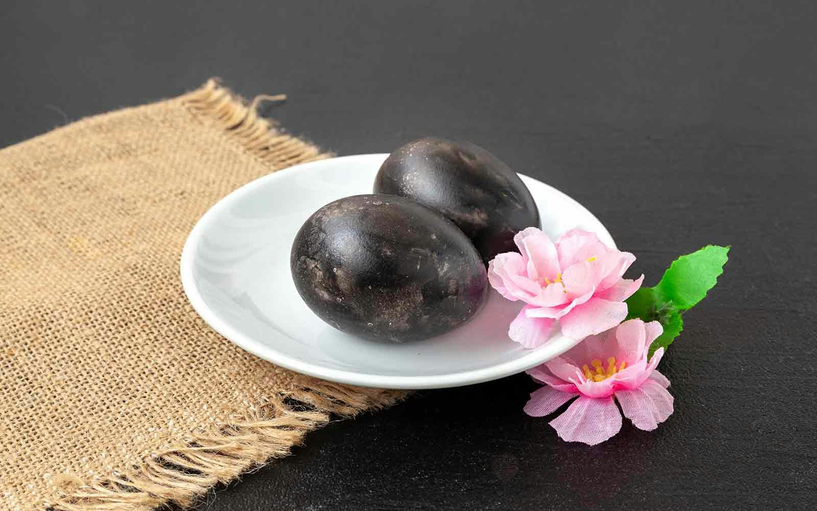 Black eggs hard-boiled in sulfuric hot springs