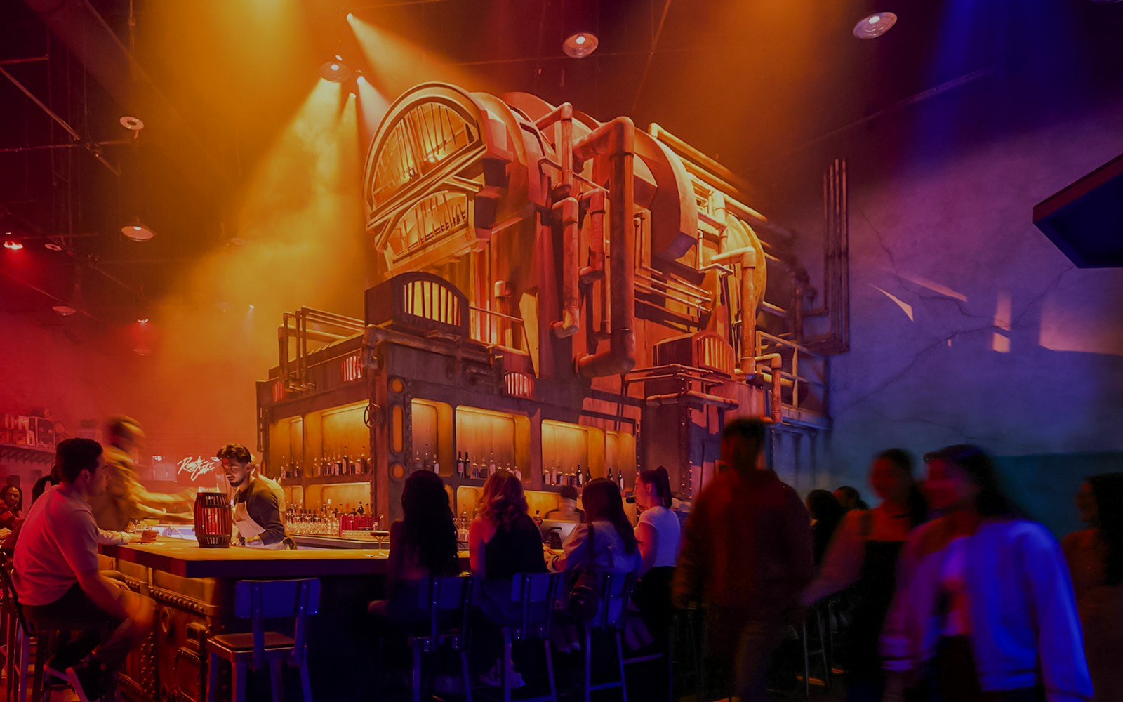 Bar scene at Universal Horror Unleashed, Las Vegas, with patrons enjoying drinks under dramatic lighting.