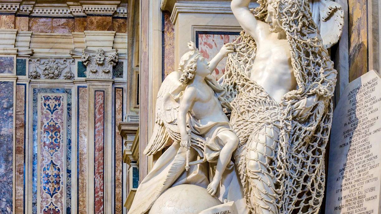 Statue of angel and veiled figure in Sansevero Chapel, Naples.