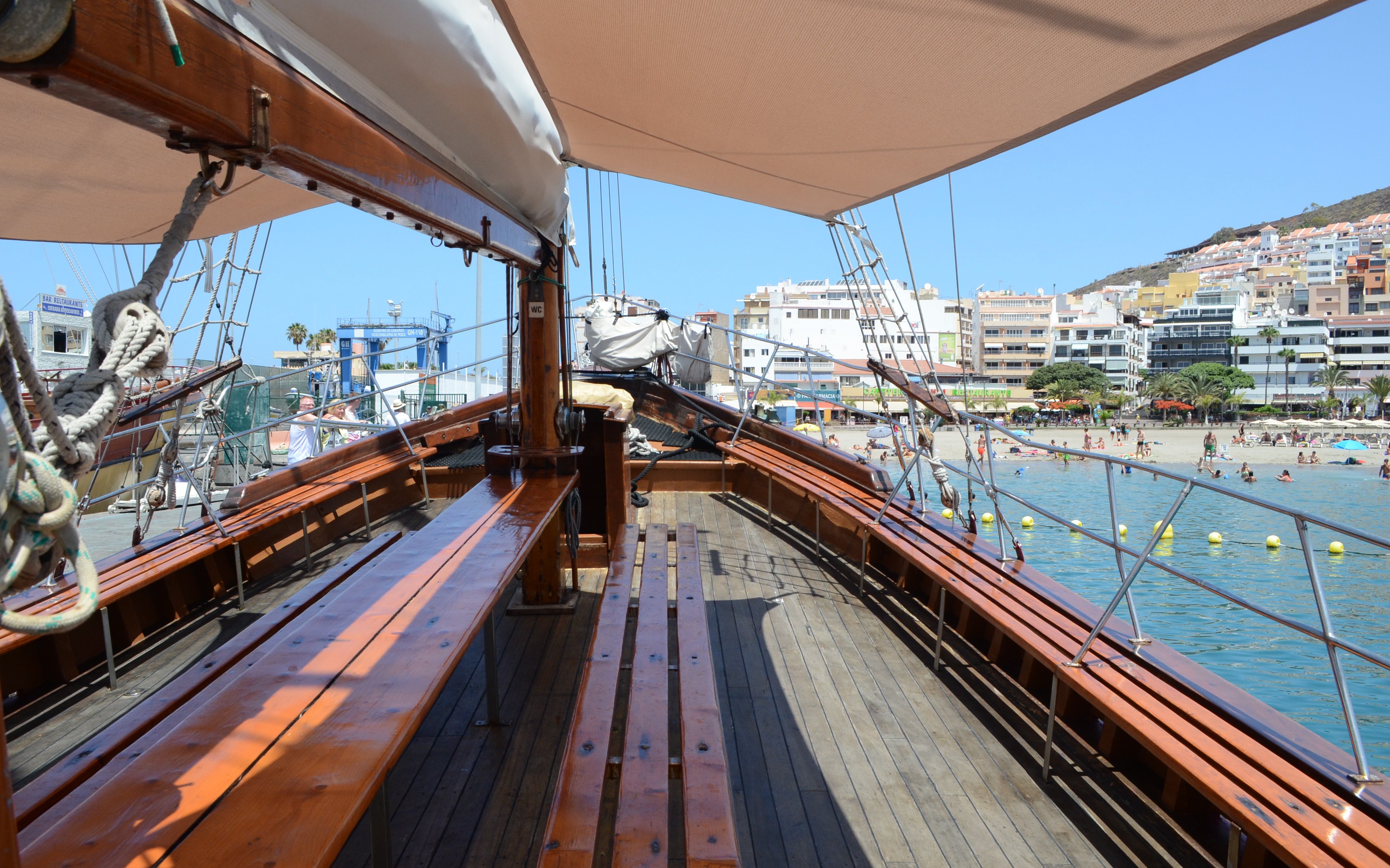 Tourists seated on Peter Pan Pirate boat in Tenerife, looking for whales and dolphins.