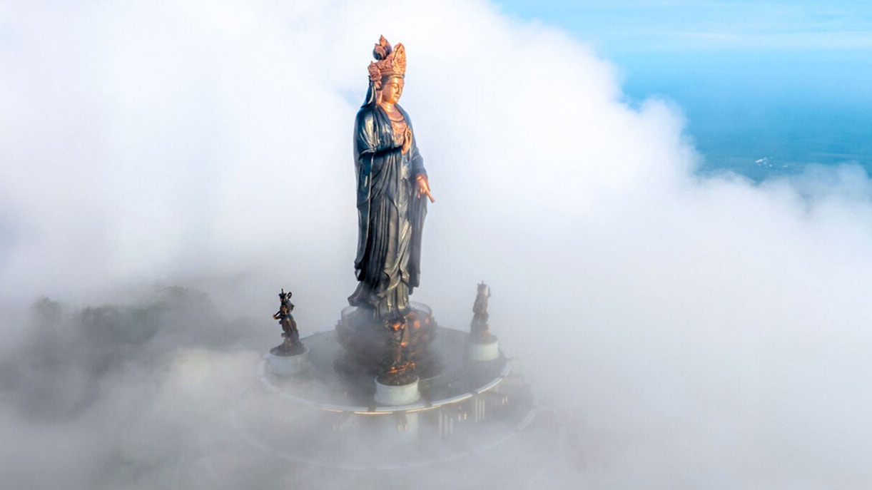 Cable car ascending Sun World Ba Den Mountain, Vietnam, with lush greenery and scenic views.