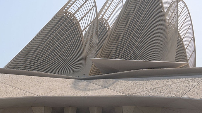 Zayed National Museum exterior with unique architectural design and fountain in Abu Dhabi.