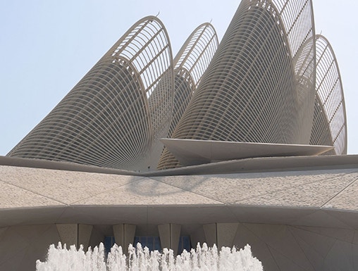 Zayed National Museum exterior with unique architectural design and fountain in Abu Dhabi.