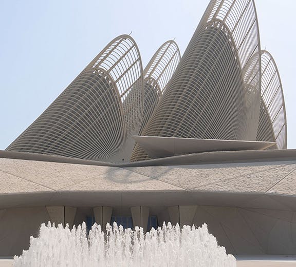 Zayed National Museum exterior with unique architectural design and fountain in Abu Dhabi.