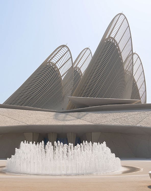Zayed National Museum exterior with unique architectural design and fountain in Abu Dhabi.