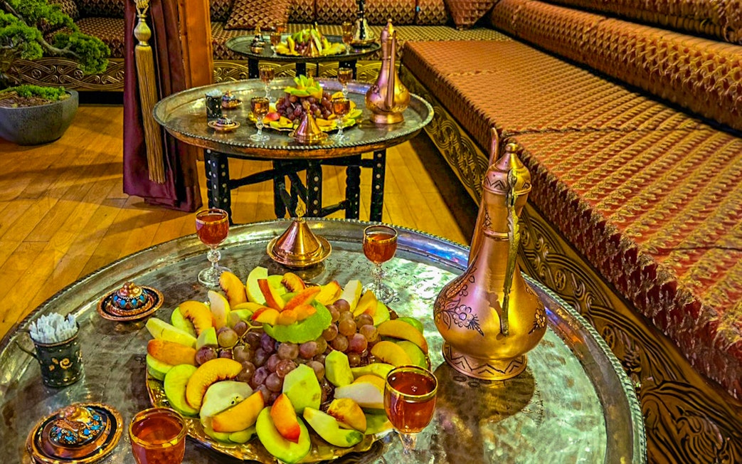 Fruit platter and traditional decor inside Gedikpasa Historical Hammam.