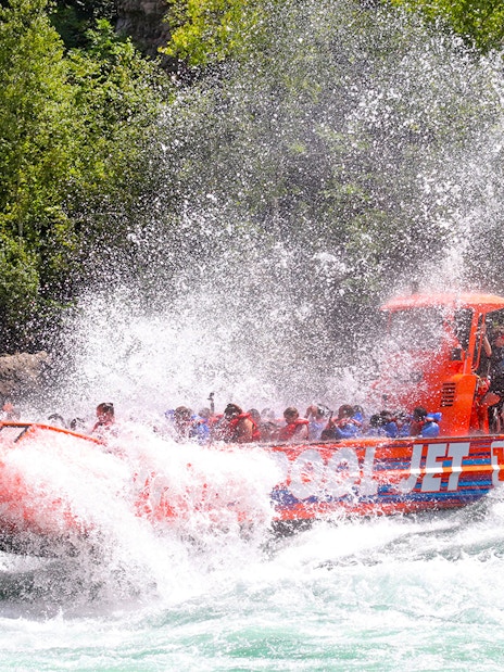 Guests enjoying a thrilling Whirlpool Jet Boat ride in the Niagara Gorge, Canada.