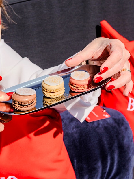 Macaroons and champagne on The Official Emily in Paris Champagne Seine Cruise.