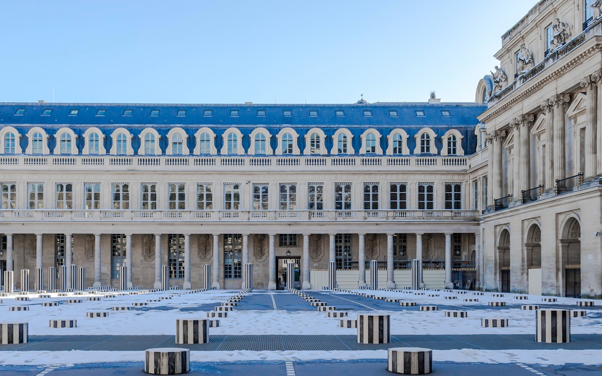 Palais Royal courtyard with striped columns, Paris filming location.