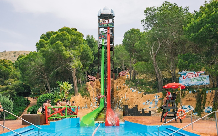 Verti-Go water slide at Aqualandia Benidorm with people preparing to slide down.