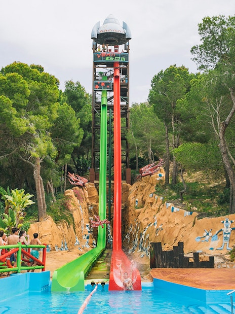 Verti-Go water slide at Aqualandia Benidorm with people preparing to slide down.