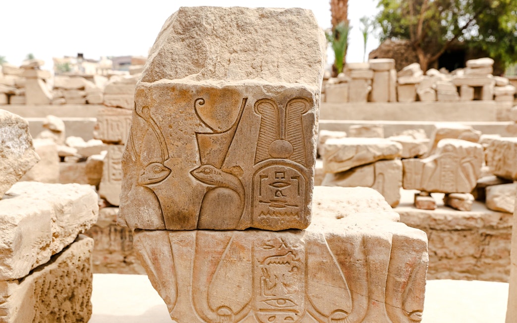 Hieroglyphics on stone block at Karnak Temple, Egypt.
