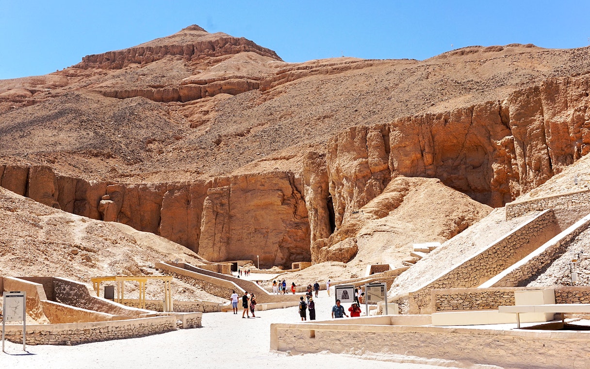 Tourists exploring the ancient tombs in the Valley of the Kings, Egypt.