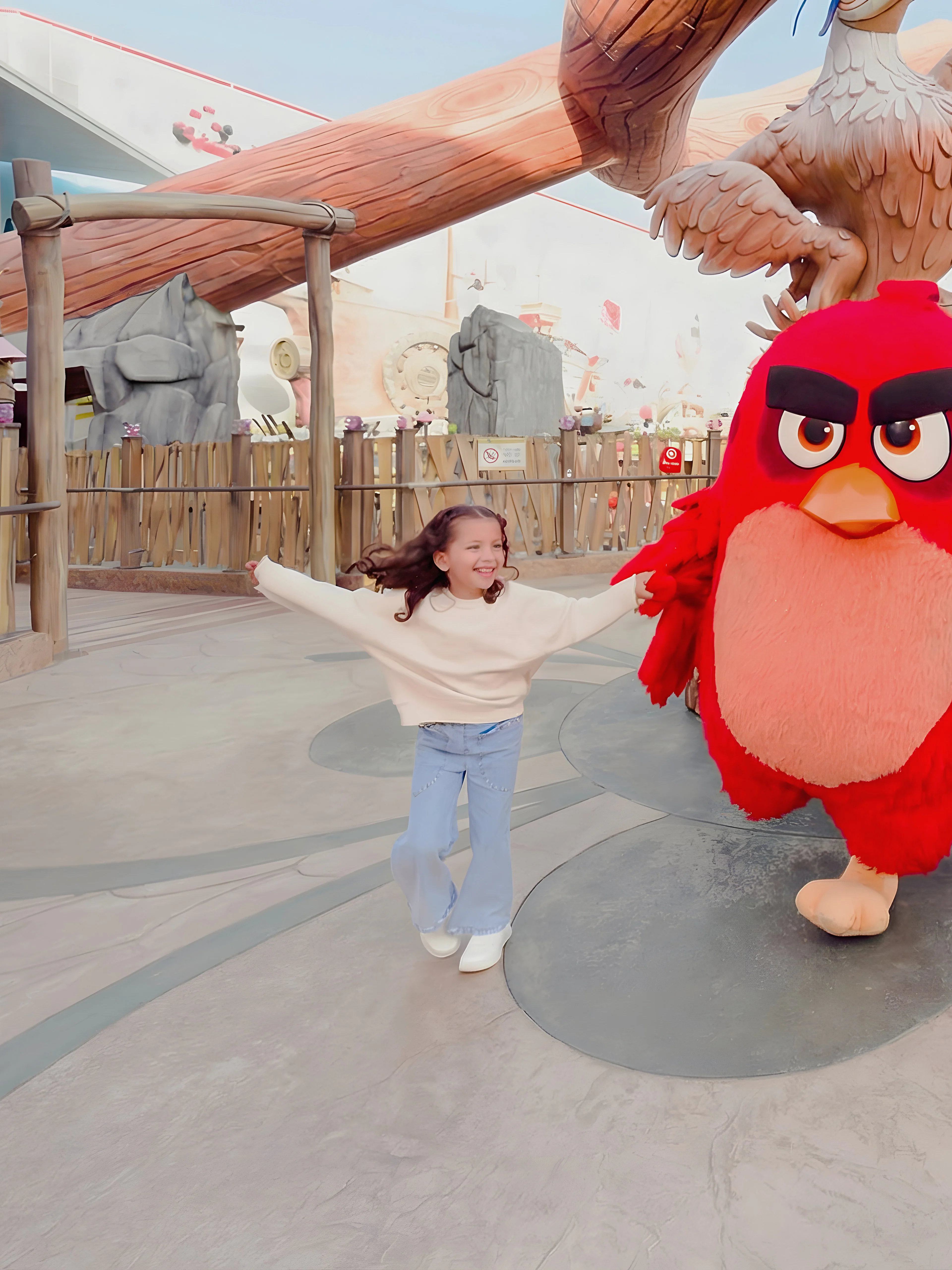Children with Angry Birds mascots at Angry Birds World Theme Park.