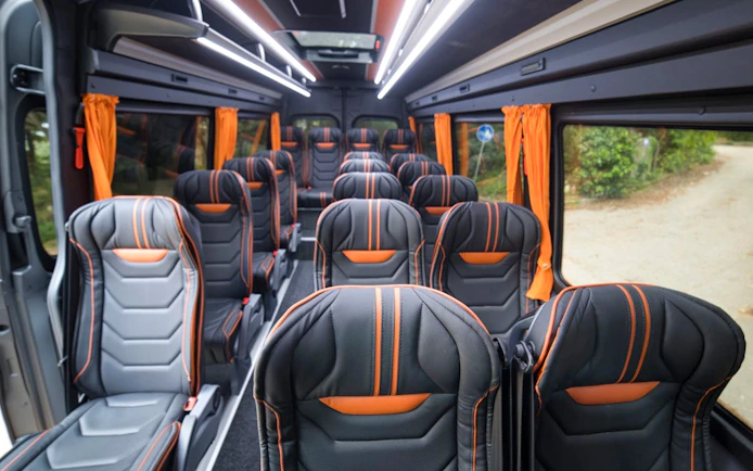 Interior of tour van for Montenegro day trip with audio guide.