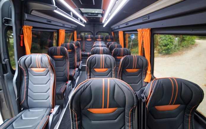 Interior of tour van for Montenegro day trip with audio guide.