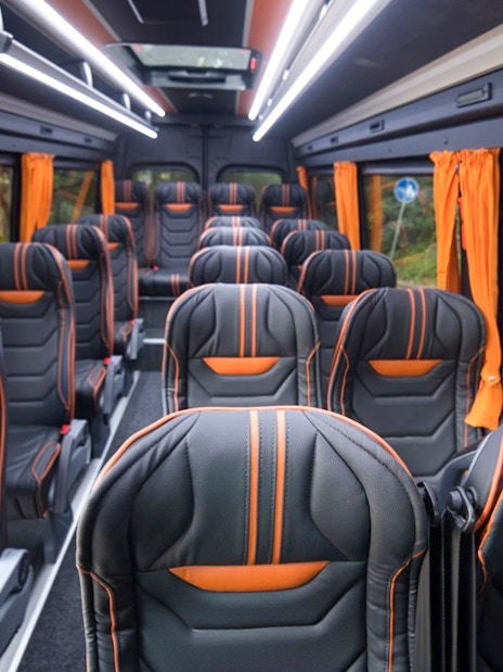 Interior of tour van for Montenegro day trip with audio guide.