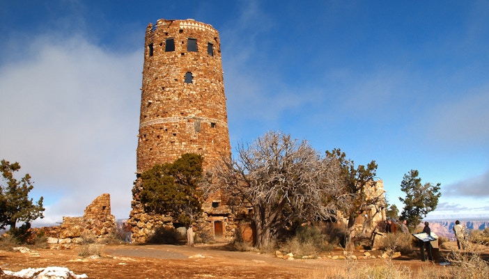 Grand Canyon Desert View Watchtower overlooking vast canyon landscape, Arizona.