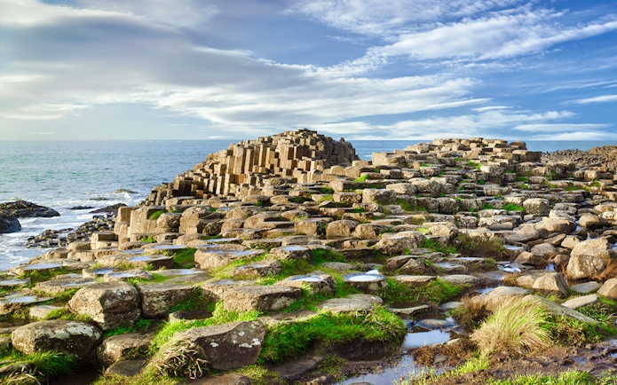 Giant's Causeway basalt columns by the sea in Northern Ireland.