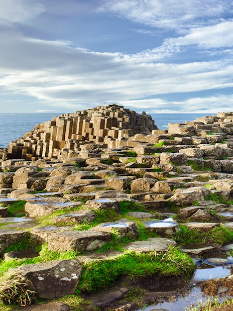 Giant's Causeway basalt columns by the sea in Northern Ireland.