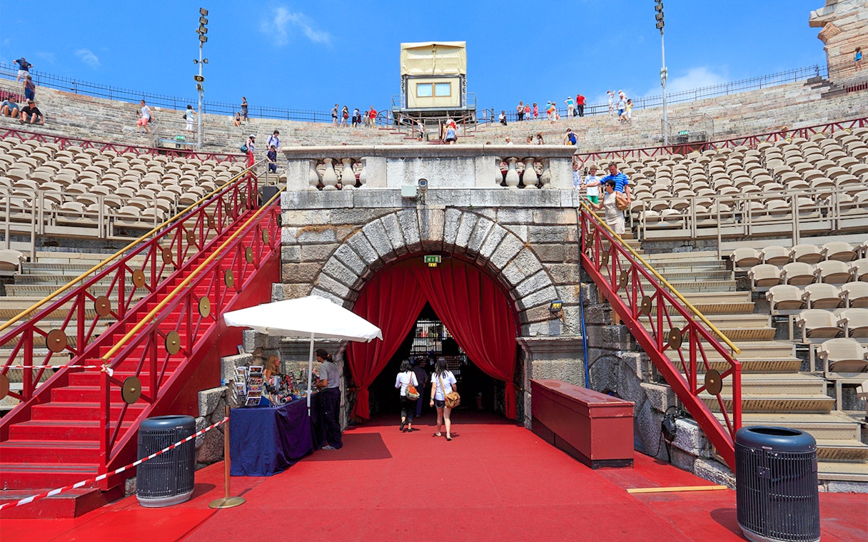 Verona Arena entrance with tourists on a skip-the-line guided tour.