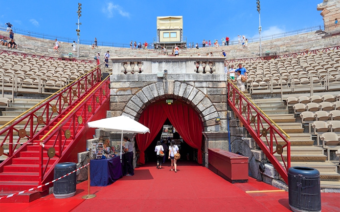 Verona Arena entrance with tourists on a skip-the-line guided tour.