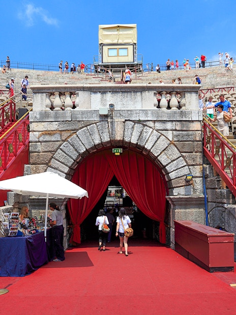 Verona Arena entrance with tourists on a skip-the-line guided tour.