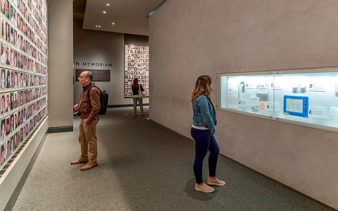 Visitors viewing exhibits inside the 9/11 Memorial Museum.