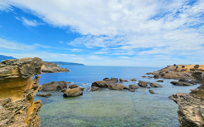 Jagged rock formations at Yehliu Geopark, Wanli District, New Taipei City, overlooking the sea.