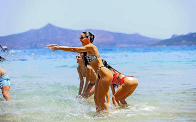 Visitors enjoying the beach during Metopi, Agistri & Aegina Islands full-day cruise.