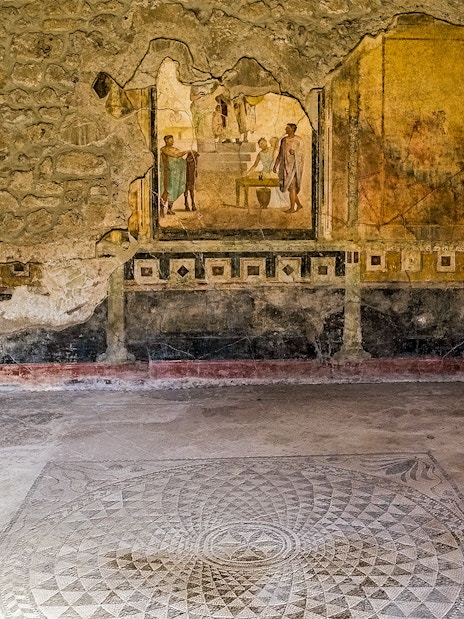 Frescoes and mosaic floor in the Samnite House, Pompeii.