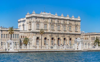 Dolmabahce Palace facade viewed from Bosphorus, Istanbul, Turkey.