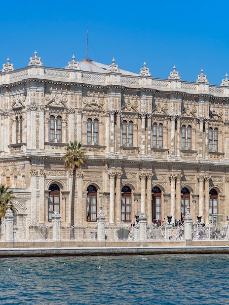 Dolmabahce Palace facade viewed from Bosphorus, Istanbul, Turkey.