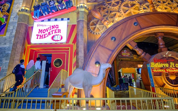 Visitors entering Ripley's Believe It or Not Moving Theater ride at Global Village.
