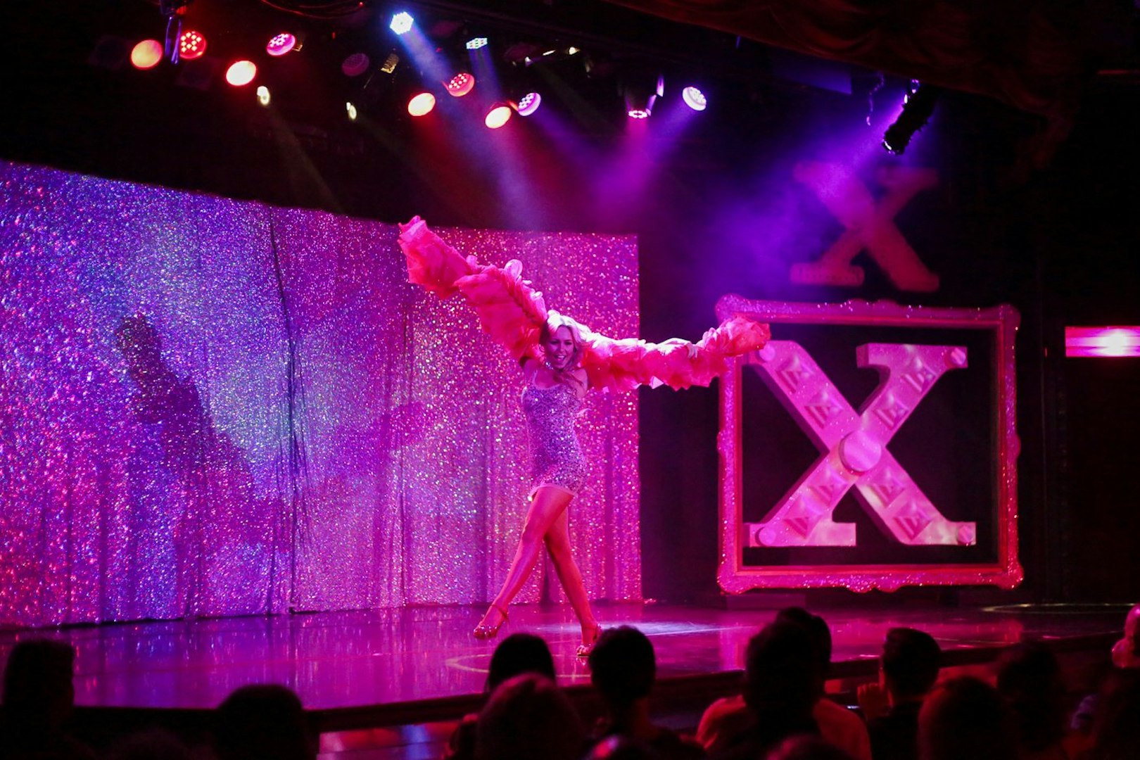 Performer on stage at X Burlesque - Kick'n Topless Revue, Vegas.