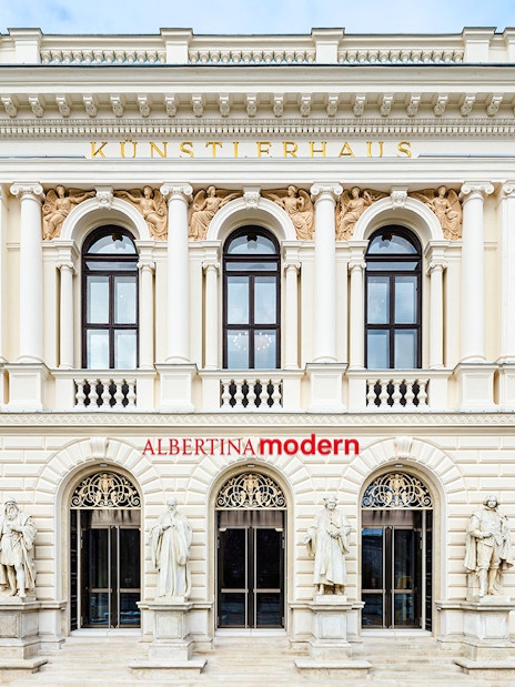 Albertina Modern entrance with classical statues, Vienna.