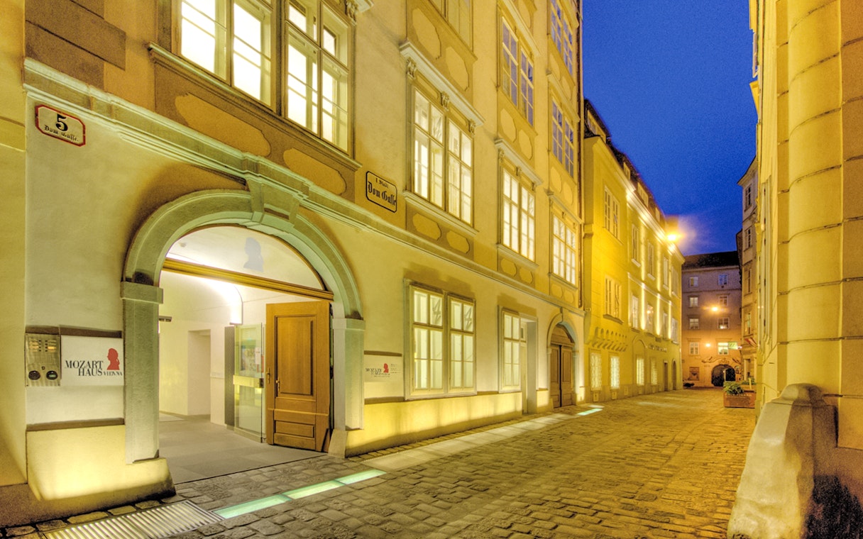 Mozarthaus Vienna entrance at night, venue for Wiener Ensemble concerts.