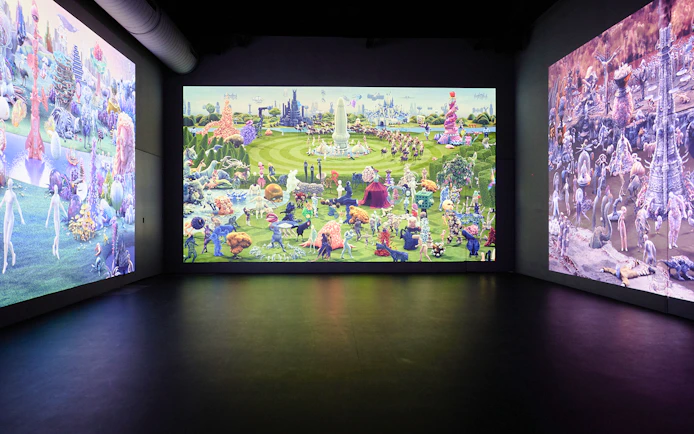 Guests viewing digital art at the Remastered audiovisual experience in Rotterdam.