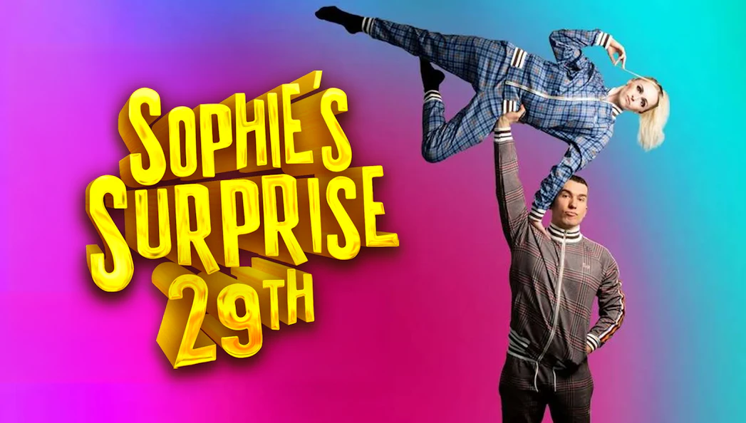 Acrobat lifting performer in plaid outfit, "Sophie's Surprise 29th" text on colorful background.